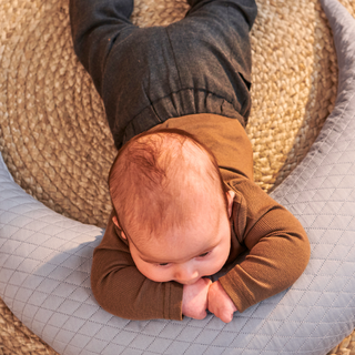 When can babies sleep on their stomach?